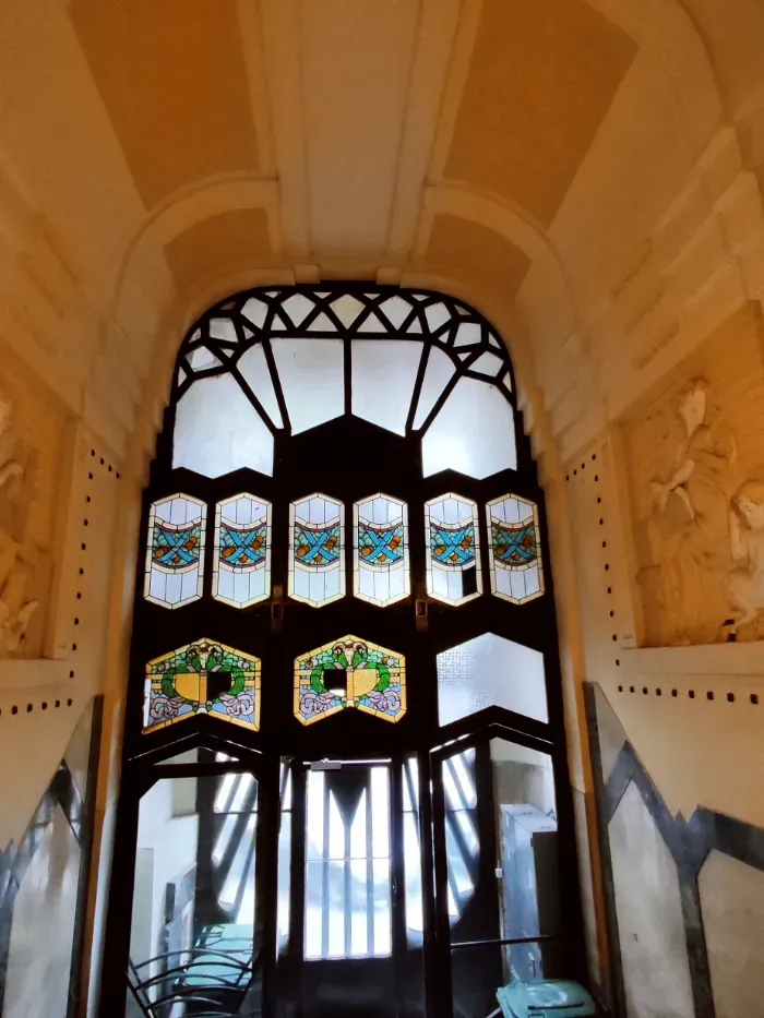 The Egyptian-style gate of the apartment building at No 13, also covered with copper elements.