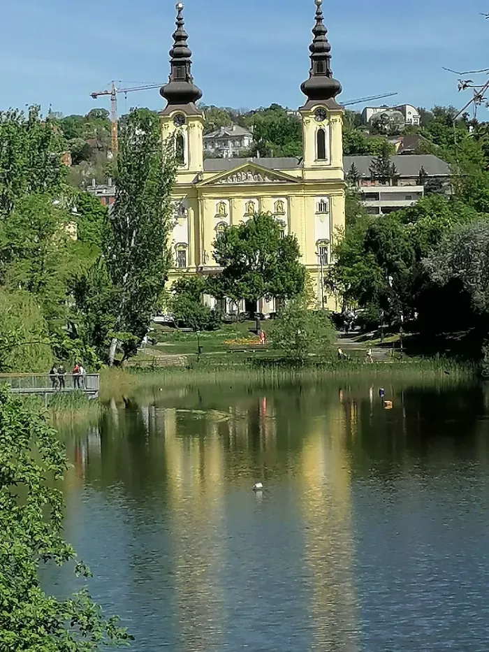 Lake Feneketlen and its park with the Cistercian St Imre Church in the background.